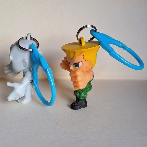 Two Capcom Street Fighter Backpack Hangers Keychain 2" Guile and Seth - Picture 4 of 7